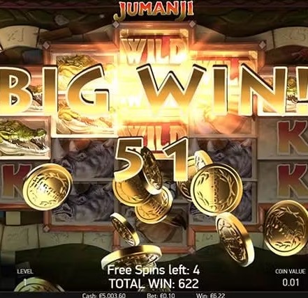 Excited player celebrating a massive jackpot win on the Jumanji slot machine.